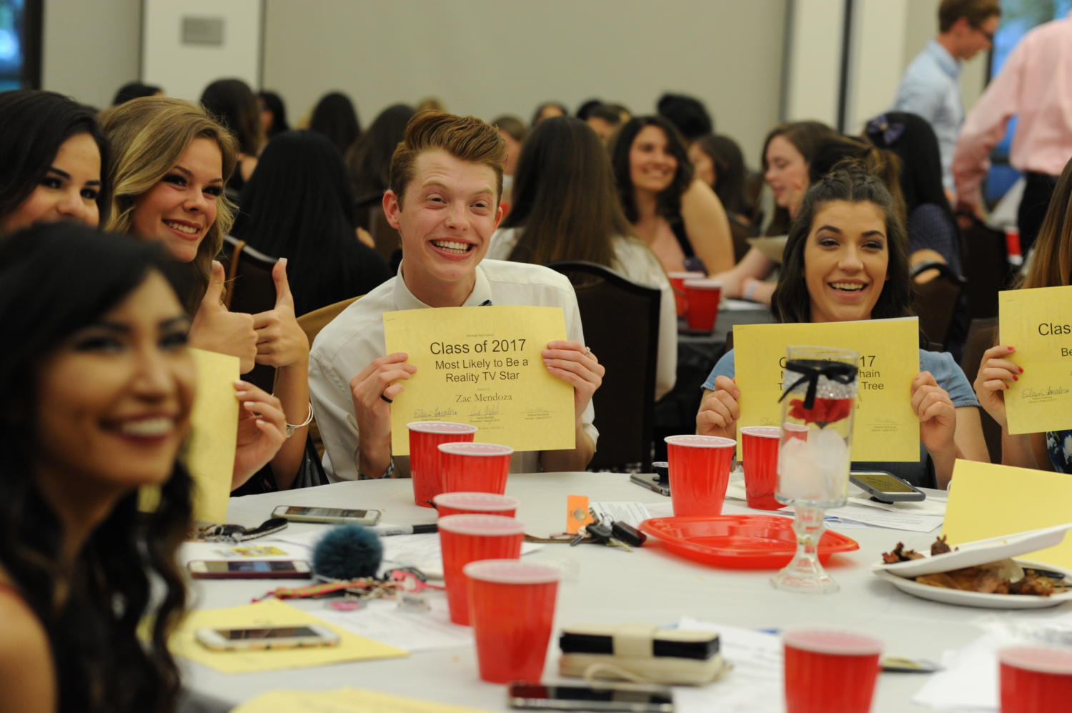 Zac Mendoza gleefully poses for a picture with his