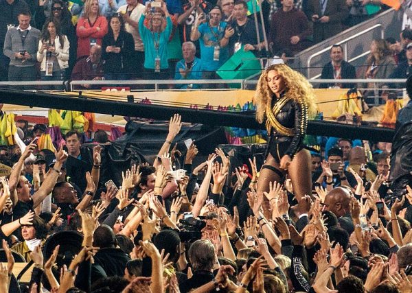 Beyonce and Bruno Mars Super Bowl 50 by Arnie Papp is licensed under CC BY 2.0.