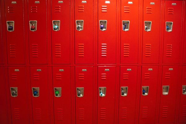 "High school lockers" by vauvau is licensed under CC BY 2.0.